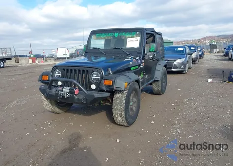 2002 Jeep Wrangler Sahara z USA, uszkodzony, nr VIN 1J4FA59S32P744124